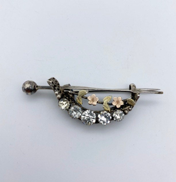 Antique Victorian metal brooch, dainty floral silver brooch